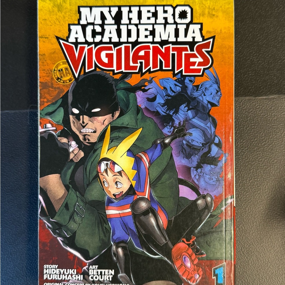 My Hero Academia: Vigilantes Manga Volume 1 (Pink and Orange Cover) - VIZ Media